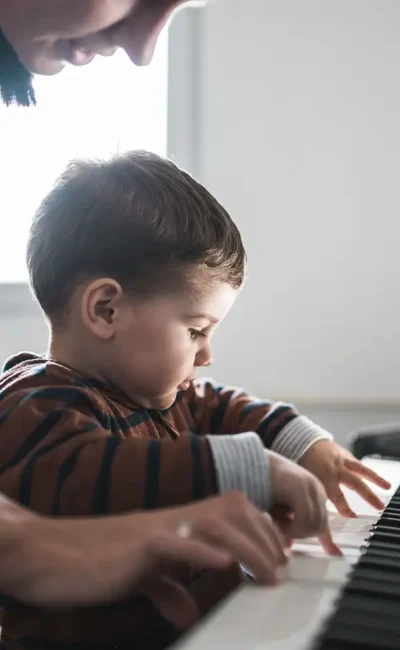 image-baby-boy-play-piano-at-home